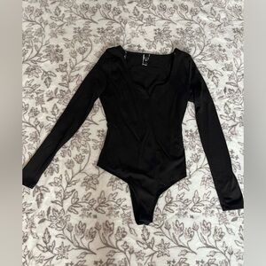 Elegant Black Ribbed Bodysuit